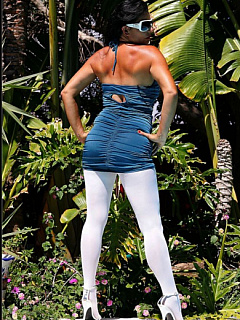 Milf eve in white pantyhose teasing in the garden image 6
