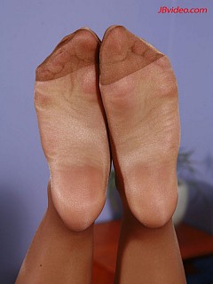 Georgia peach gives hot pantyhose footjob till cumshot image 7