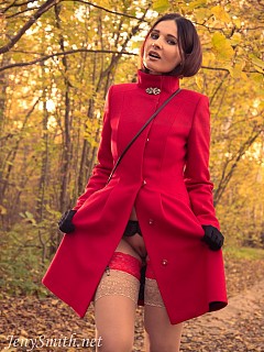 Jeny in an autumn wood takes off her image 2