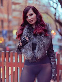 Jeny on a city street in tights image 6