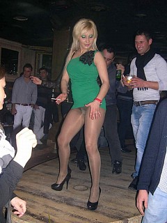 Hottest girls flashes her pantyhose on a party image 6